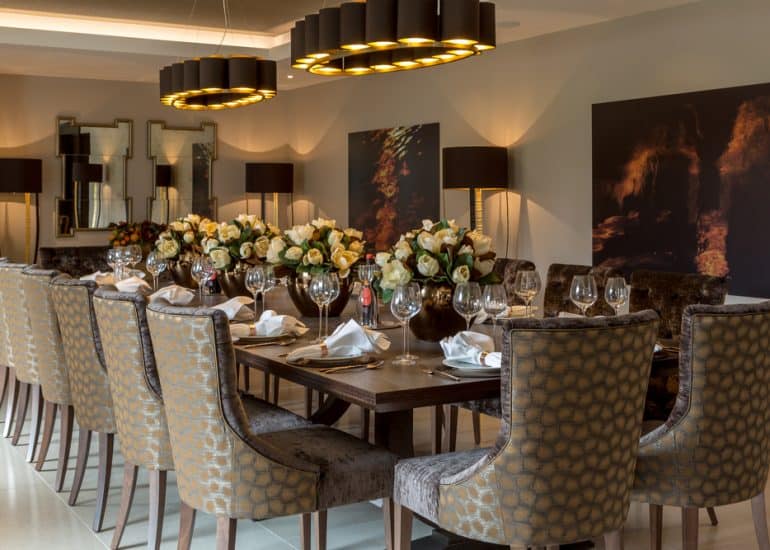 Floor lamps create a great atmosphere together with pendants over the table.